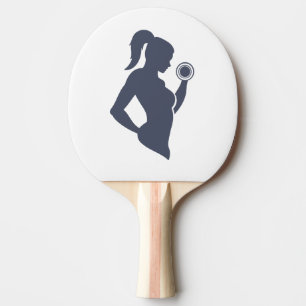 Fitness girl lifting dumbbell ping pong paddle