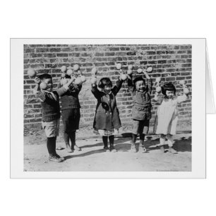 Five Asian Children holding up Barbells