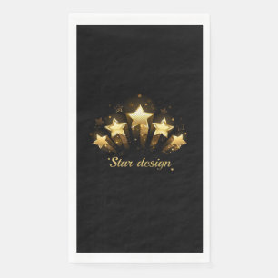 Five gold stars on black napkin
