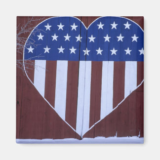 Flag in heart shape painted on barn after 9-11. magnet
