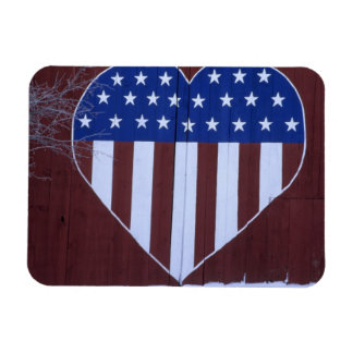 Flag in heart shape painted on barn after 9-11. magnet