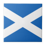 Flag of Scotland Tile<br><div class="desc">The flag of Scotland consists of a blue background and a white cross representing the cross of the Christian martyr "the apostle Saint-André".</div>