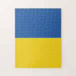 Flag of Ukraine Button Jigsaw Puzzle<br><div class="desc">The flag of Ukraine is a banner of two equally sized horizontal bands of blue and yellow. The top represents sky and the yellow represents wheat. 
 The National Flag of Ukraine</div>