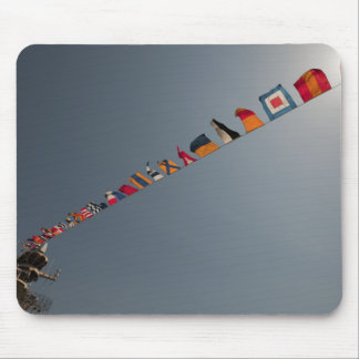 Flags fly over the deck of the USS Iwo Jima Mouse Mat
