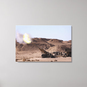 Flame and smoke emerge from the muzzle canvas print