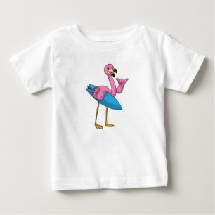 Flamingo as Surfer with Surfboard Baby T-Shirt