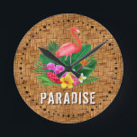 Flamingo Floral Paradise Round Clock<br><div class="desc">A pink flamingo,  tropical flowers and leaves on woven wicker print pattern and the word PARADISE makes a stylish summer themed wall clock. MATCHING items in our store.</div>