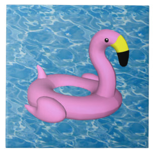 Flamingo pool toy on blue water tile