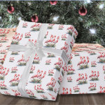 Flamingo Tropical Christmas Wrapping Paper<br><div class="desc">Celebrate the holidays with a bit of surf and sand with this festive wrapping paper featuring three pink flamingos wearing Santa hats and ornament accents at the base. Wish your loved ones a happy holiday season in beachy style. Whether you live in a beach or tropical location like Florida, Hawaii,...</div>