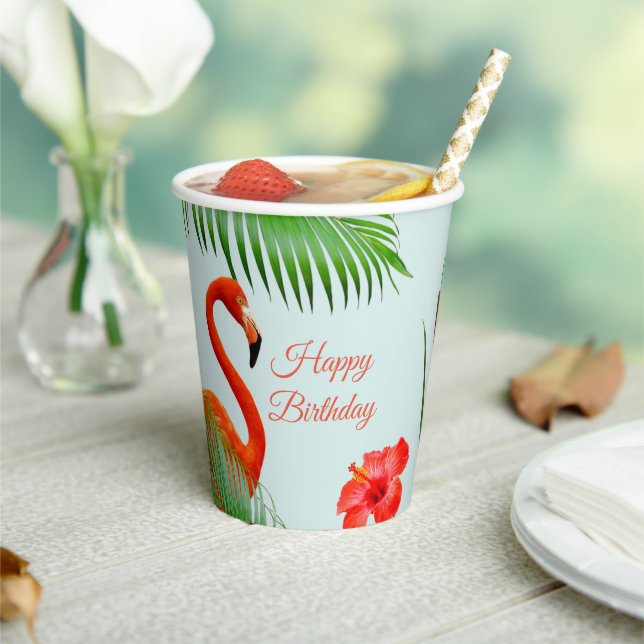 Flamingos, hibiscus and palm leaves on light blue  paper cups (Insitu)