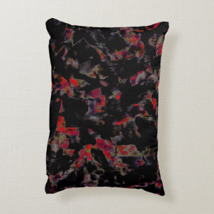Flashy red blots on dark grey rocky base, texture decorative cushion