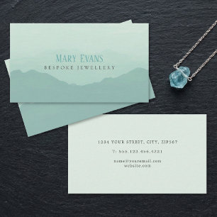 Flat green and blue painted mountains business card