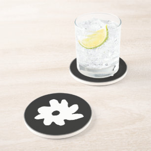 floral design . a black and white flower coaster