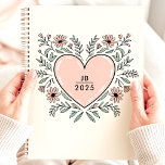 Floral Heart 2025 Monogram Planner<br><div class="desc">Embrace love and organisation with this charming planner featuring a heart-shaped floral design. Personalise it with your monogram for a unique and heartfelt touch. This planner is perfect for keeping track of appointments, to-dos, and all your important dates throughout 2025. With its lovely design and ample writing space, it's a...</div>