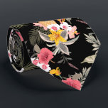 Floral Hibiscus Pineapple Hawaiian Print Black Tie<br><div class="desc">Exotic pink and white hibiscus flowers, yellow lilies, pineapples, palm fronds and tropical foliage on a black background, this men's neck tie is cool for the office, a night on the town, a wedding, for the groom or groomsmen or give as a gift to your husband, dad, brother or best...</div>