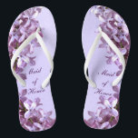 Floral Lilac Flowers Wedding Maid of Honour Flip Flops<br><div class="desc">Lilacs are the theme of these elegant floral Maid of Honour wedding flip flops with pink and mauve lilac flowers on a purple background.  The text can be customised for your special occasion.</div>