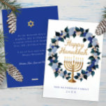Floral Menorah Hanukkah Holiday Card<br><div class="desc">Celebrate Hanukkah with grace and tradition using this beautiful holiday card featuring a golden menorah encircled by a lush watercolor floral wreath in blue, navy, and blush. The elegant gold script greeting and fully customisable message on the back make it perfect for sending warm wishes to friends and family. Personalise...</div>