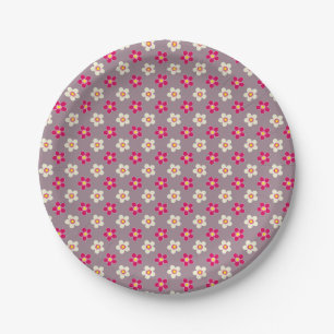 Floral pattern of crimson and white flowers on a c paper plate
