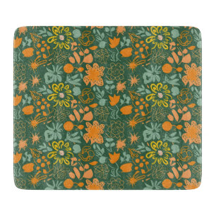 Floral pattern on a dark green background cutting board