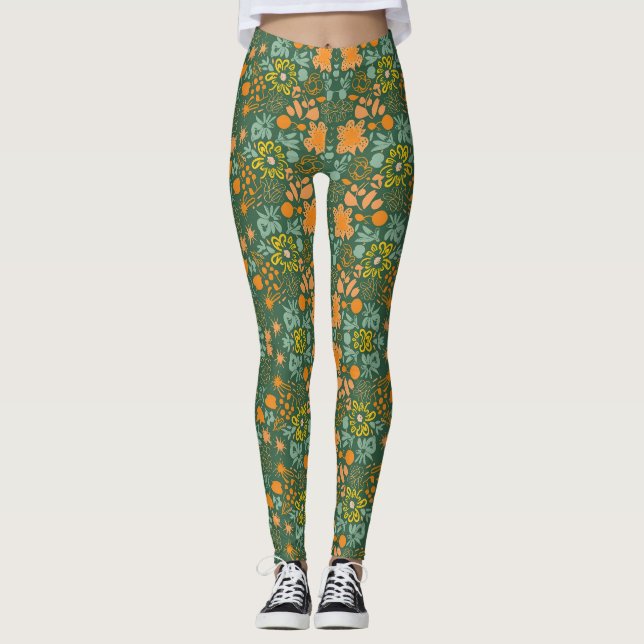 Floral pattern on a dark green background  leggings (Front)