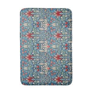 Floral pattern on green leaves blue background bath mat