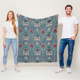 Floral pattern on green leaves blue background fleece blanket