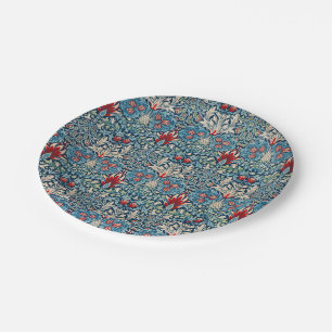 Floral pattern on green leaves blue background paper plate
