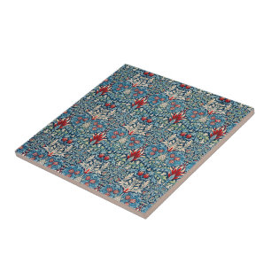 Floral pattern on green leaves blue background tile
