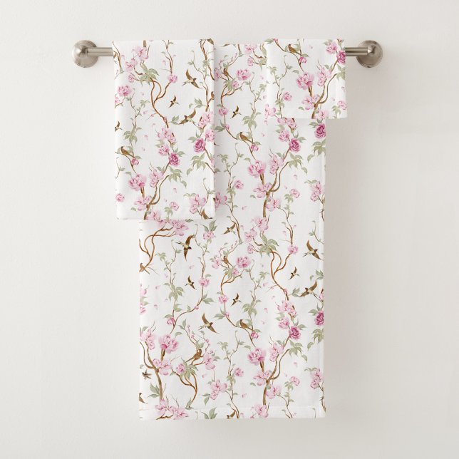 Floral-patterned towels hang neatly (Creator Uploaded)