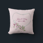 Floral Ribbon Heart with Wedding Date Throw Pillow<br><div class="desc">Pink flowers with green ivy bouquet on white satin ribbon heart on soft pink textured background.
Can be used for anniversary or wedding gift.</div>