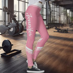 Floral striped modern girly pink with name leggings<br><div class="desc">These pink stylish workout leggings feature an elegant white floral design on the waistband and on the ankles and calves and white stripes on the waistband.
Easily customisable by adding your name on both sides on a calligraphy white font.</div>