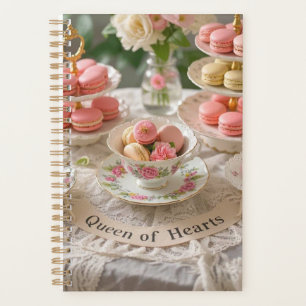 Floral table, teacups, tiered trays macarons queen planner