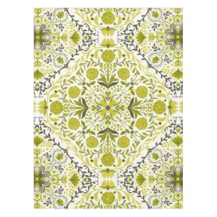Floral tiles in green tablecloth