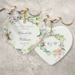 Floral Wedding Ornament Anniversary Ornamenent<br><div class="desc">Featuring a delicate watercolor floral garland,  this chic wedding or anniversary keepsake ornament can be personalized with your special anniversary message,  names and date. The reverse features a matching floral garland framing elegant monogram initials. Designed by Thisisnotme©</div>