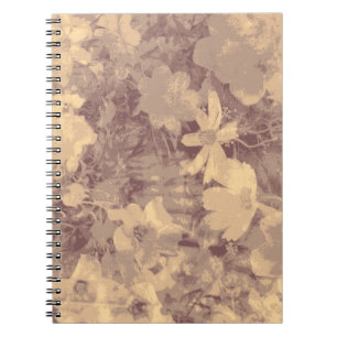 Flower and leaf camouflage pattern on beige notebook