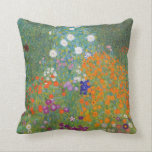 Flower Garden (by Gustav Klimt) Cushion<br><div class="desc">This design features a painting by Austrian artist Gustav Klimt (1862–1918). It is a depiction of a beautiful flower garden in Klimt's typical impressionist style. The flowers almost look like they're overflowing, and it's impossible not to feel uplifted by their beauty. The original work was completed in 1907 and its...</div>