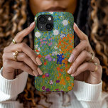 Flower Garden | Gustav Klimt iPhone 15 Case<br><div class="desc">Flower Garden (1905-1907) by Austrian artist Gustav Klimt. Original fine art painting is oil on canvas featuring a bright abstract landscape of colourful flowers. 

Use the design tools to add custom text or personalise the image.</div>