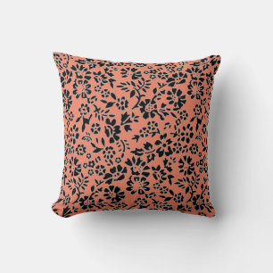 Flowered black/salmon throw pillow. cushion