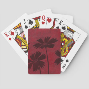 Flowerhead Silhouettes on Crimson Background Playing Cards