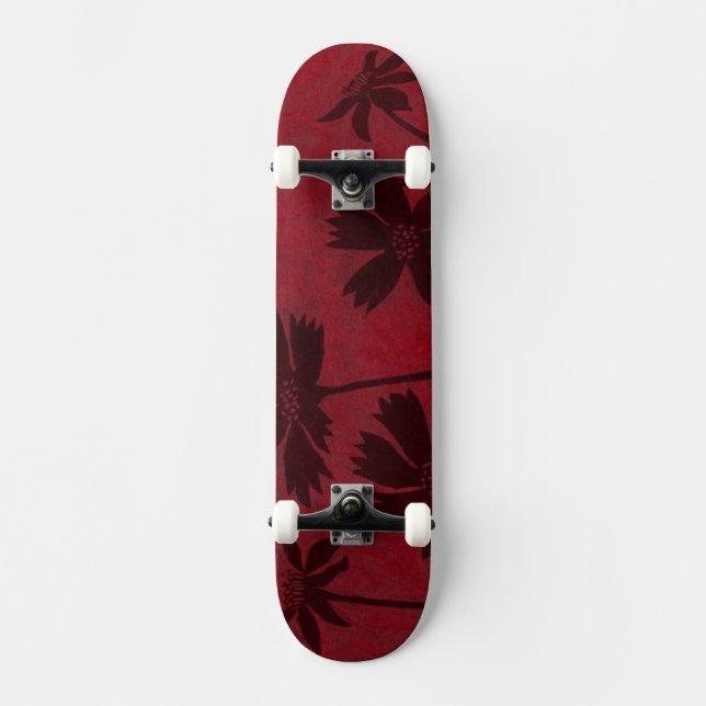 Flowerhead Silhouettes on Crimson Background Skateboard (Front)
