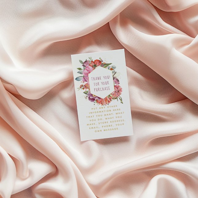 Flowers and macaroons gold border enclosure card (Floral thank-you card with watercolor flowers and gold text, placed on soft blush fabric background)