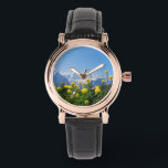 Flowers | Eiger Monch Swiss Alps Watch<br><div class="desc">This amazing Getty Images photo features the landscape of meadow with yellow flowers in the Swiss Alps in front of famous mountains Eiger Monch Jungfrau near Grindelwald and Interlaken.</div>