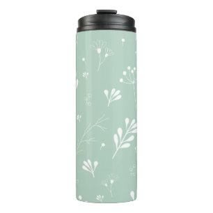 Flowers green background twigs thermal tumbler