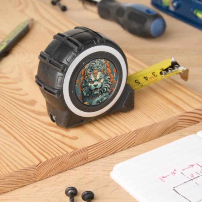 Flu Lion of Wisdom 1 (Asian Lion Head tape measure  inches on one side with metrics on the other. Clip plastic /rubber. )