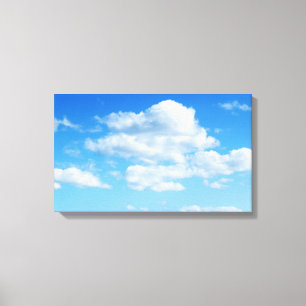 Fluffy Clouds and Blue Sky Canvas Print