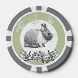 Fluffy hare with butterflies on green background poker chips