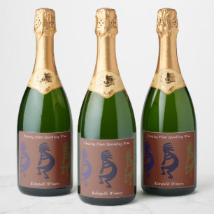 Flute Playing Kokopelli Figures on Rust Red Champa Sparkling Wine Label