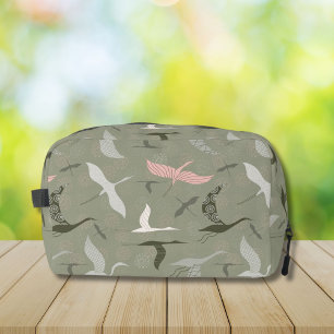 Flying cranes pattern on sage green dopp kit