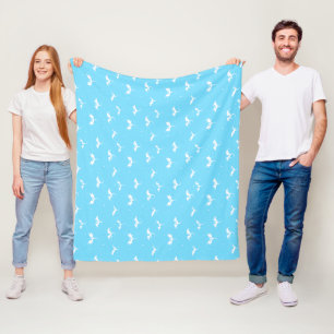 Flying dragons and stars on blue background fleece blanket