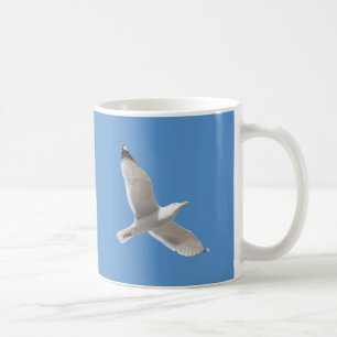 Flying gull coffee mug